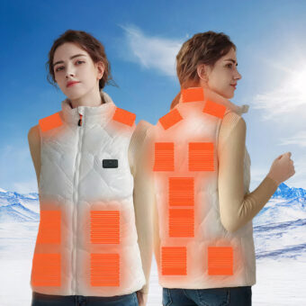 Weiße, ärmellose, elektrisch beheizbare Daunenjacke für Frauen mit einem Schneeberg im Hintergrund
